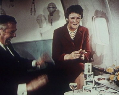 1950s Building a house of cards in the First Class lounge of a Pan Am Boeing 707.